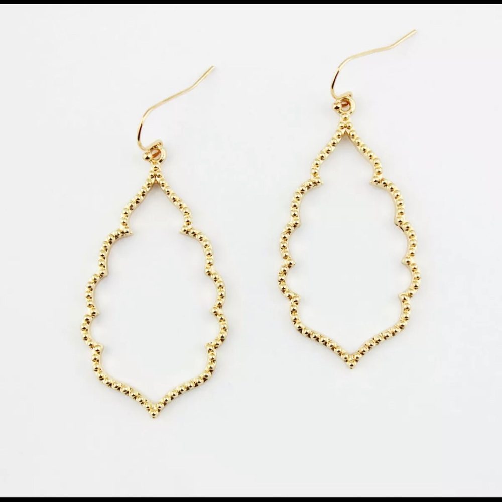 Gold tone tear drop shape dangle earrings